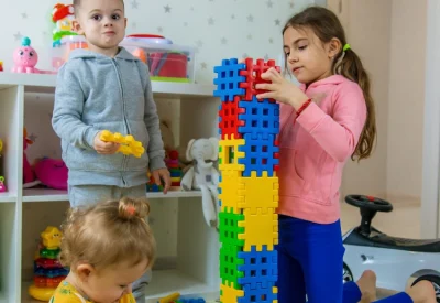 children-playing-with-toys-in-the-room-selective-2026-01-09-00-48-46-utc