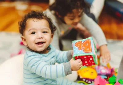 happy-mixed-race-toddler-boy-at-home-playing-with-2026-03-09-04-35-54-utc