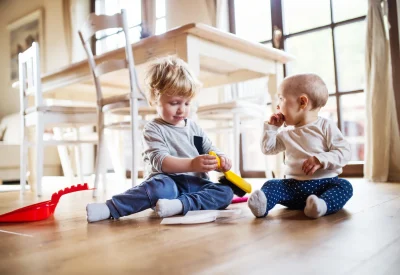 two-toddlers-with-brush-and-dustpan-at-home-2026-03-10-01-59-37-utc
